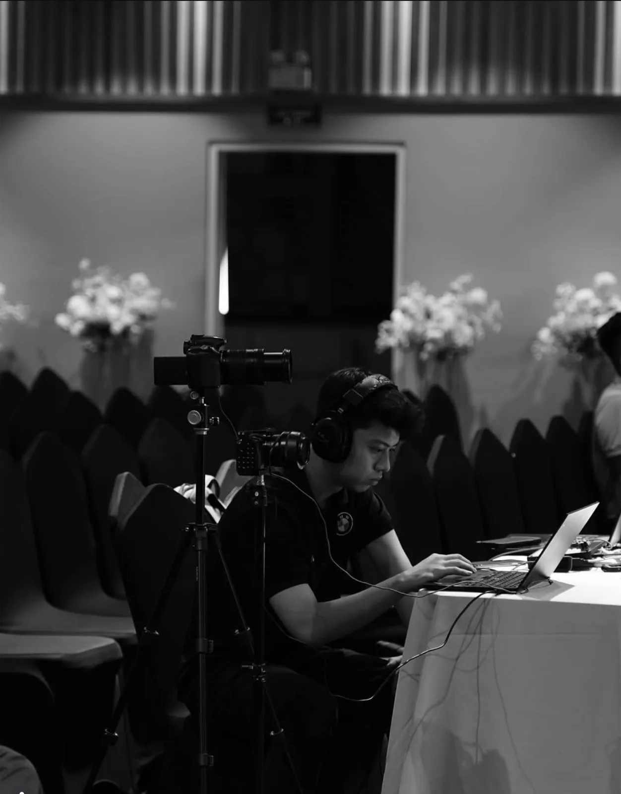 Duc, founder and director at Nokta, reviewing a shot on set